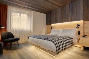 Un pat sau paturi într-o cameră la HOTEL de LEN