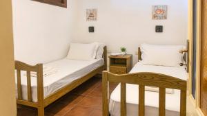 Posteľ alebo postele v izbe v ubytovaní Casa Avineira