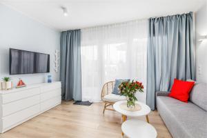 Televiisor ja/või meelelahutuskeskus majutusasutuses Holiday Point