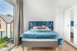 Posteľ alebo postele v izbe v ubytovaní Holiday Point