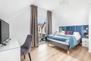 Posteľ alebo postele v izbe v ubytovaní Holiday Point