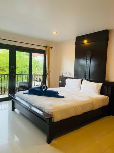 Postel nebo postele na pokoji v ubytování Koh Tao Regal Resort - SHA Plus