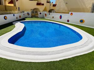 Bazén v ubytovaní Maraverde holiday apartment by AltamarHomes alebo v jeho blízkosti