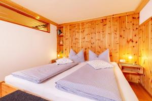 Una cama o camas en una habitación de Wilder Kaiser