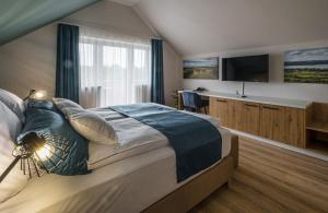 Posteľ alebo postele v izbe v ubytovaní Kistücsök Food & Room