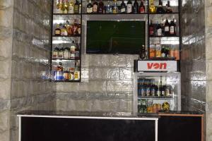 Ο χώρος του lounge ή του μπαρ στο Zimbo Golden Vip Lodge