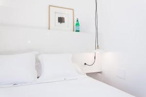 Posteľ alebo postele v izbe v ubytovaní Hostal Argo