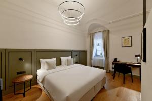 Łóżko lub łóżka w pokoju w obiekcie Herbal Hotel Wrocław