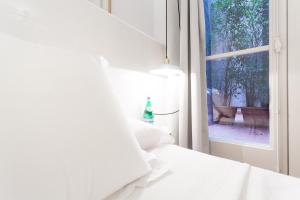 Posteľ alebo postele v izbe v ubytovaní Hostal Argo