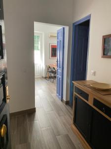 TV a/nebo společenská místnost v ubytování Apartamento Imperial Sevilla city center