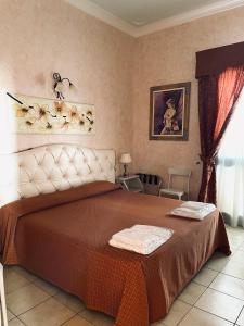 Кровать или кровати в номере Hotel Salento Gold Beach