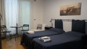 Postel nebo postele na pokoji v ubytování VentoVerde B&B