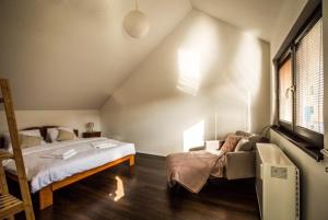 Postel nebo postele na pokoji v ubytování Dovolenkový dom - Kompas