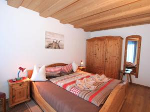Кровать или кровати в номере Apartment Alpenland-1 by Interhome