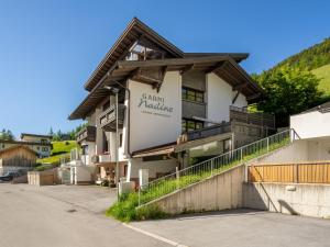 um edifício com um sinal na lateral em Apartment Nadine - SOE407 by Interhome em Sölden