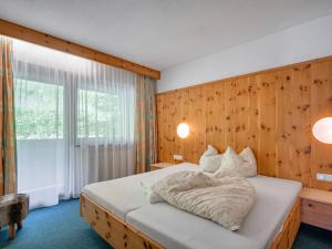 Posteľ alebo postele v izbe v ubytovaní Apartment Nadine-1 by Interhome