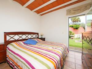 A bed or beds in a room at Holiday Home Bellademar by Interhome