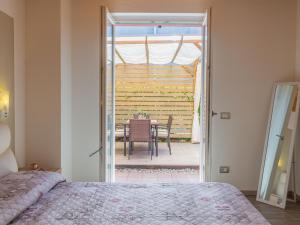 Posteľ alebo postele v izbe v ubytovaní Holiday Home Gelsomini - CCO520 by Interhome