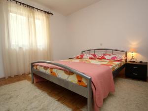 Giường trong phòng chung tại Apartment Repak by Interhome +4 ảnh