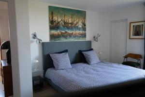 Superbe T4 vue mer à Royan, 2 min à pied des plages客房内的一张或多张床位