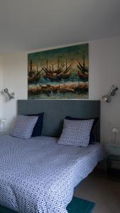 Superbe T4 vue mer à Royan, 2 min à pied des plages客房内的一张或多张床位