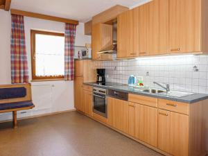 Kuchyň nebo kuchyňský kout v ubytování Apartment Stark-2 by Interhome + 14 fotografií