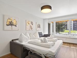 Postel nebo postele na pokoji v ubytování Apartment Triangel D Meyer by Interhome