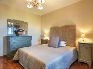 A bed or beds in a room at Holiday Home Piero by Interhome