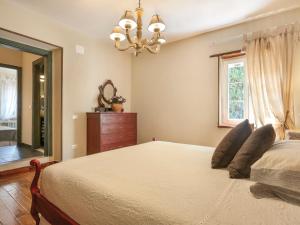 A bed or beds in a room at Holiday Home Piero by Interhome