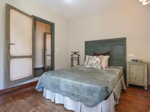 A bed or beds in a room at Holiday Home Piero by Interhome