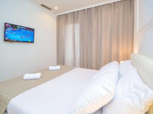 Postel nebo postele na pokoji v ubytování Holiday Home Dalmacia by Interhome