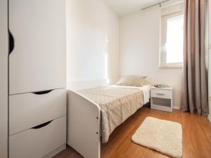 Postel nebo postele na pokoji v ubytování Holiday Home Dalmacia by Interhome