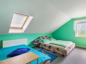 Posteľ alebo postele v izbe v ubytovaní Holiday Home Penzion Jindřiška by Interhome