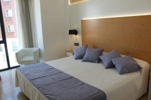Postel nebo postele na pokoji v ubytování Hotel La Noyesa *** Superior