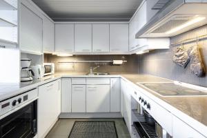 Kuchyň nebo kuchyňský kout v ubytování Kumpare apartments