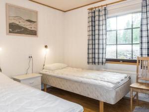 Postel nebo postele na pokoji v ubytování Holiday Home Kevinlevi by Interhome