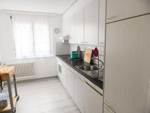 Kuchyň nebo kuchyňský kout v ubytování Apartment Simona Fontile 11 by Interhome + 14 fotografií