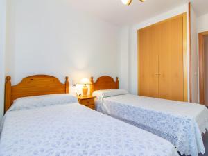 Postel nebo postele na pokoji v ubytování Apartment Mar de Oropesa II-2 by Interhome