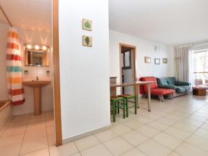 A seating area at Apartment Els Pins Eduardo-7 by Interhome Még 31 kép