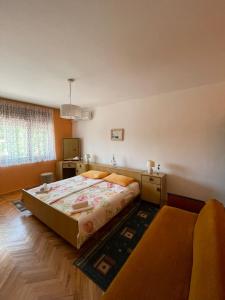 Posteľ alebo postele v izbe v ubytovaní Apartmani Pavat