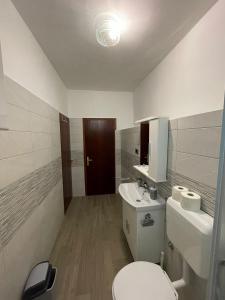 Kúpeľňa v ubytovaní Apartmani Pavat