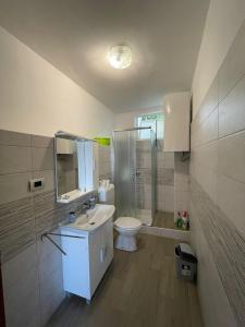 Kúpeľňa v ubytovaní Apartmani Pavat