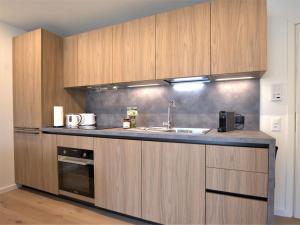 Kuchyň nebo kuchyňský kout v ubytování Apartment Chesa Stè 8 by Interhome