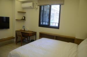 Postel nebo postele na pokoji v ubytování Rebecca Hostel
