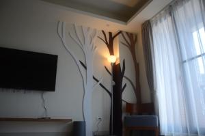 TV a/nebo společenská místnost v ubytování Rebecca Hostel