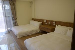Postel nebo postele na pokoji v ubytování Rebecca Hostel