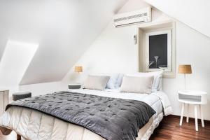 Postel nebo postele na pokoji v ubytování GITE DE L'ORME