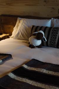 Postel nebo postele na pokoji v ubytování NI-NEWEN Hotel & Lodge
