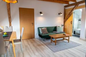 Χώρος καθιστικού στο Ferienwohnung Kogeler See