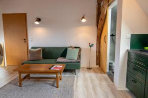 Χώρος καθιστικού στο Ferienwohnung Kogeler See